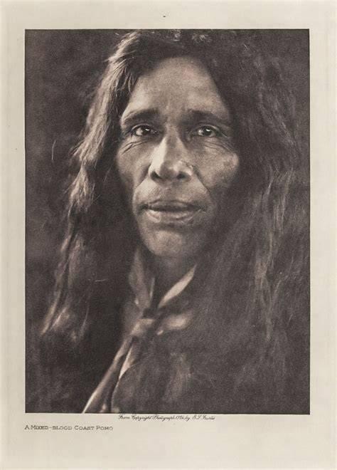 Edward S. Curtis — A Mixed-Blood Coast Pomo woman, long dark hair, dignified close portrait, sepia photogravure 1924